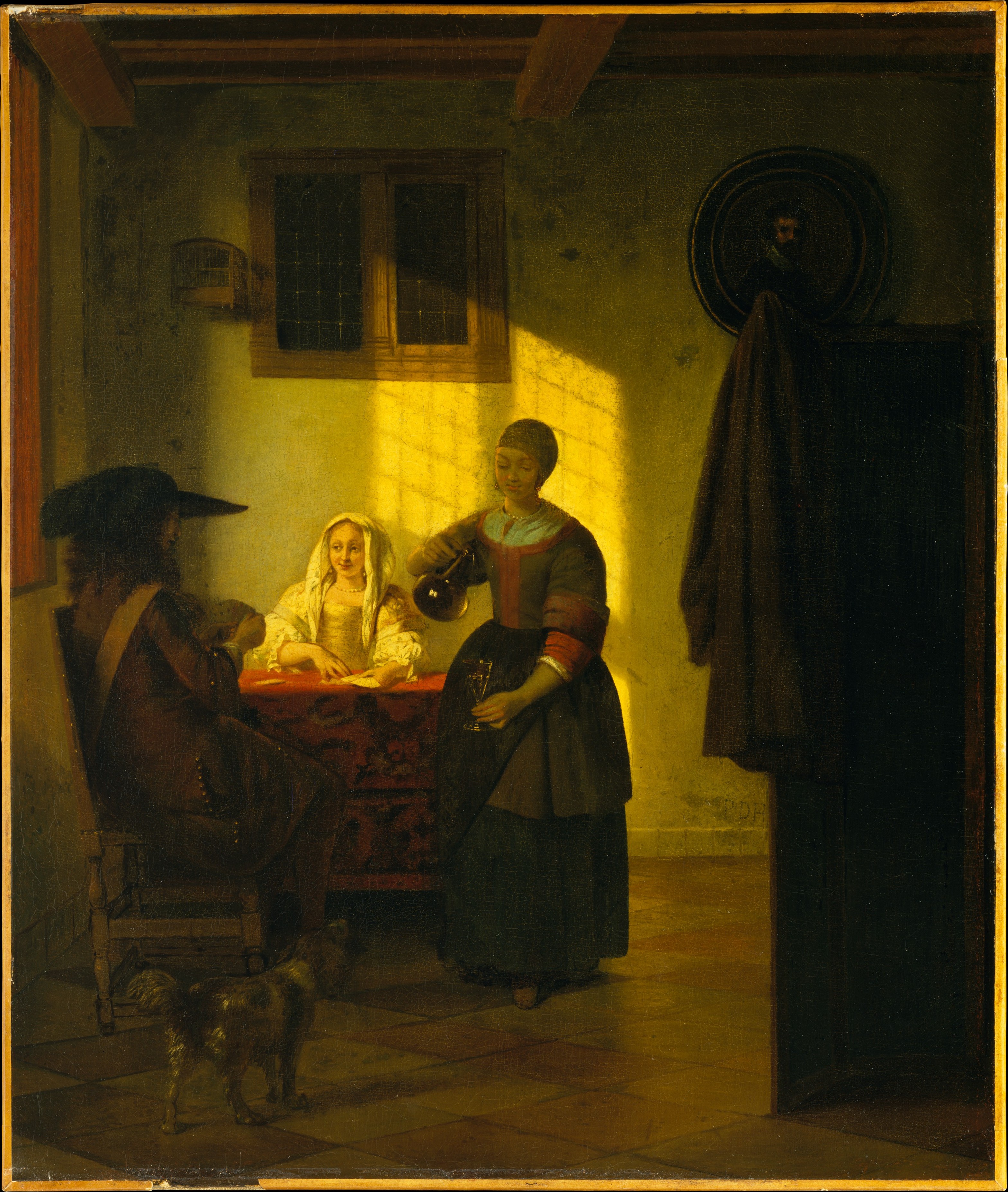 A Couple Playing Cards, with a Serving Woman by Pieter de Hooch