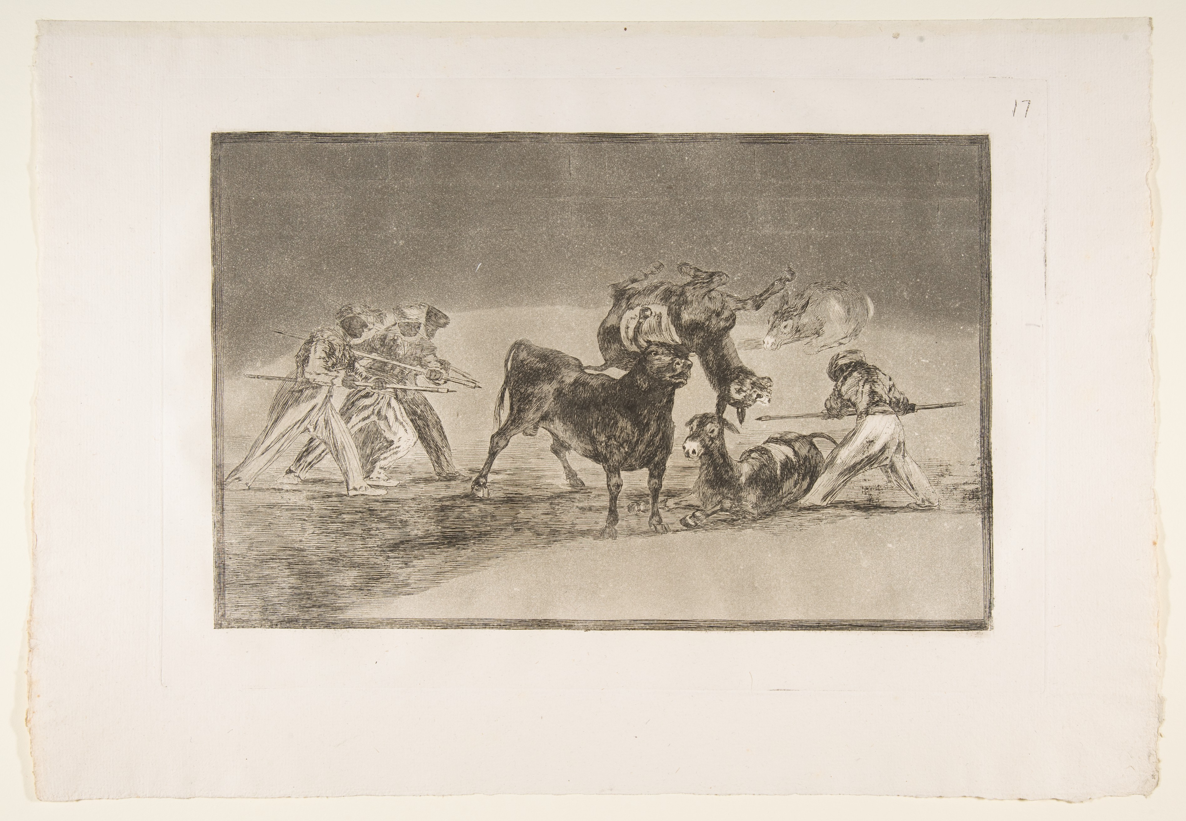 Plate 17 of "La Tauromaquia": The Moors use donkeys as a barrier to defend themselves against the bull whose horns have been tipped with balls by Goya (Francisco de Goya y Lucientes)